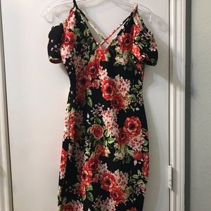 Selling a short, bodycon floral dress